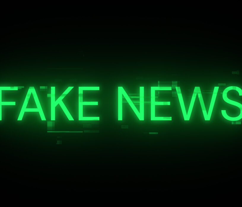 Fake news text with screen effects of technological failures. Spectacular screen glitch with various kinds of interference