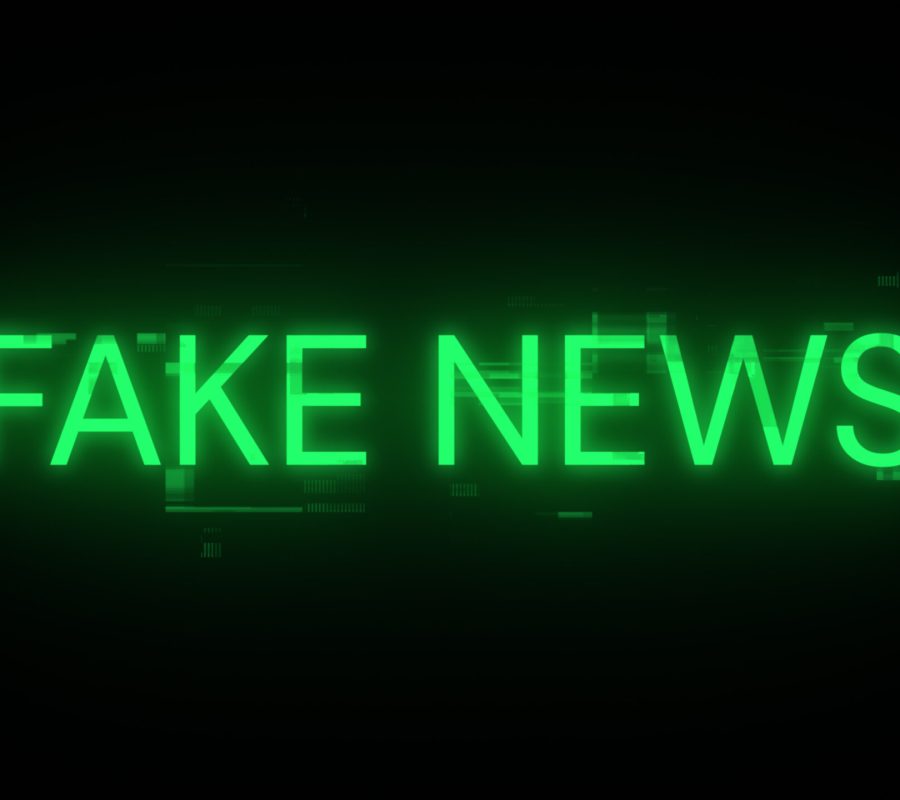 Fake news text with screen effects of technological failures. Spectacular screen glitch with various kinds of interference