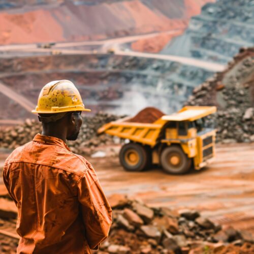 mining-worker-quarry-with-large-dump-truck